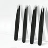 A set of four black precision stainless steel tweezers for eyebrow grooming displayed vertically.