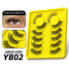 Yellow plastic tray containing 10 pairs of black false eyelashes with a 15mm length.