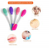 A set of silicone facial mask applicators in various colors including green, purple, and pink for applying masks and ointment