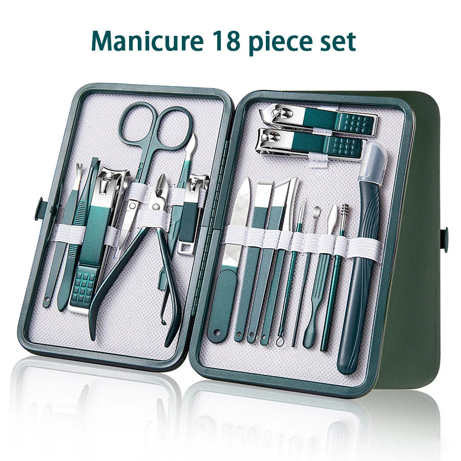 A manicure 18 piece set in a green travel case showing various stainless steel tools and instruments.