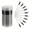 A container of disposable eyelash and eyebrow makeup brushes with black bristles.