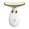 A white electric facial lifting and firming massager with a gold-colored handle.