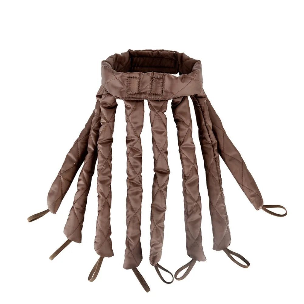 A set of brown removable heatless hair curlers for overnight styling.