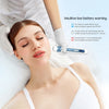 A woman is using a professional EMS microneedling pen for at-home skin rejuvenation device.