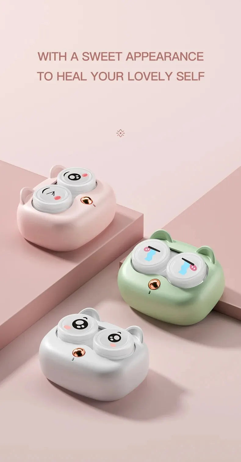 Three small, round silicone cases for cleaning contact lenses in pink, mint green, and white.