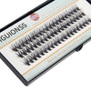 A close-up view of a DIY individual lash cluster product featuring natural wispy eyelash extensions.