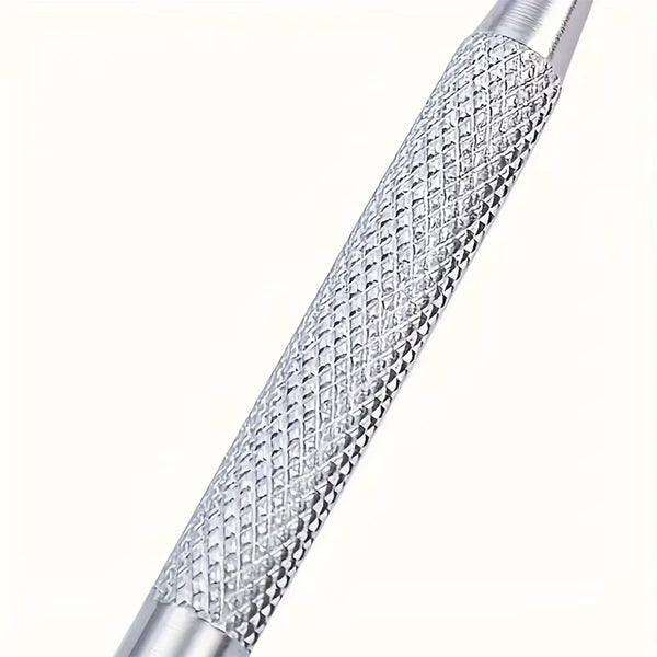 Close-up view of a stainless steel ingrown toenail pedicure tool with a textured handle.
