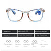 A pair of light blue and orange patterned reading glasses shown from the front.