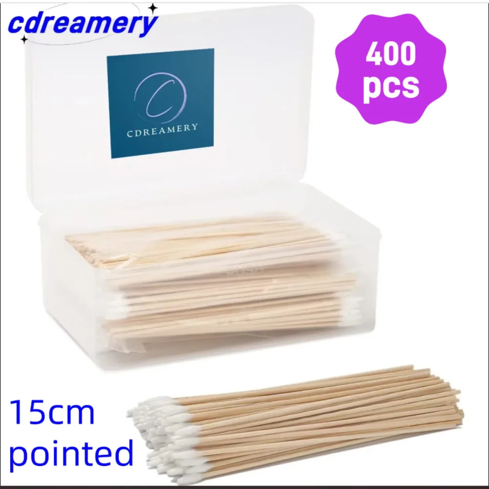 A box containing 400 pointed wooden cotton swabs, 15cm long.