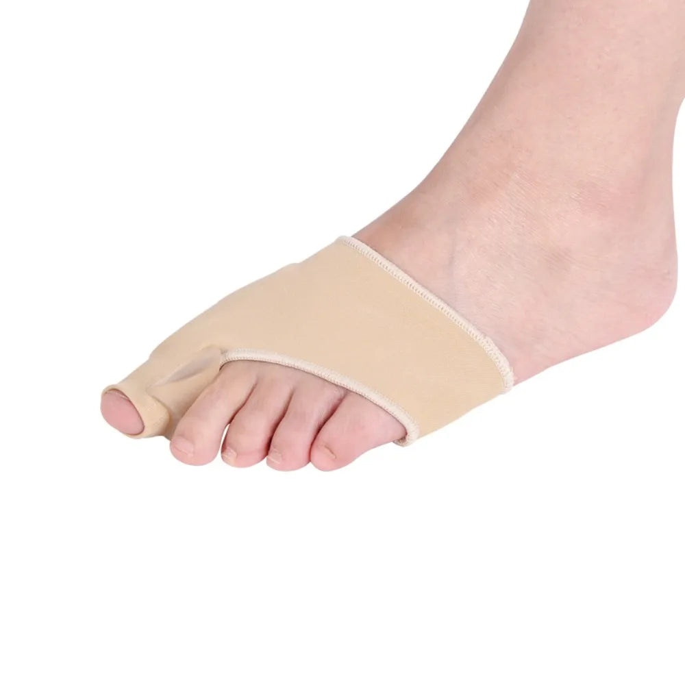 A beige orthopedic toe separator and corrector set worn on a foot.