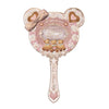 A vintage-style pearl hand mirror with a pink frame, a bow, and small teddy bears.