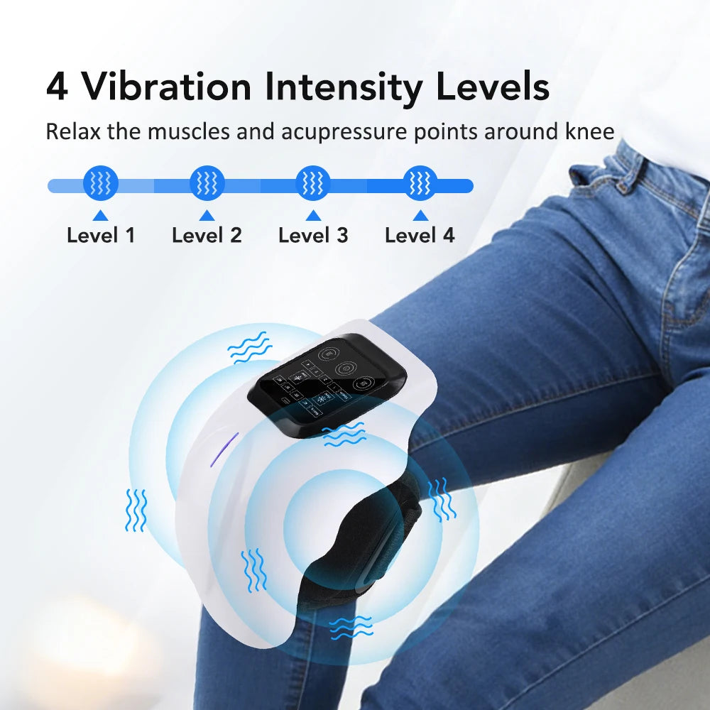 A hand holding an infrared knee massager device with vibration intensity levels displayed on the skin of a person's leg.