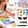 A collection of colorful resin glitter and beads, including a palette, sunglasses, and tools for DIY crafting.