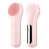 A pink sonic facial cleansing brush with a textured silicone head and a sleek body is shown from the side.