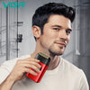 A man holds a red electric beard trimmer near his neck, demonstrating the grooming tool.