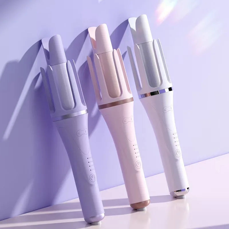 Three professional automatic hair curling irons in lilac and pink shades displayed against a purple background.