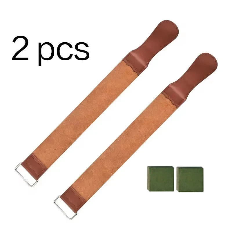 Two brown leather sharpening strips with green square pads for a straight razor.