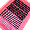 A pink tray of manga lash clusters with bottom and spikes for volume DIY eyelash extensions.