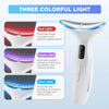 A white multi-mode LED beauty and massage device is shown with three colored light options: red, purple, and blue.