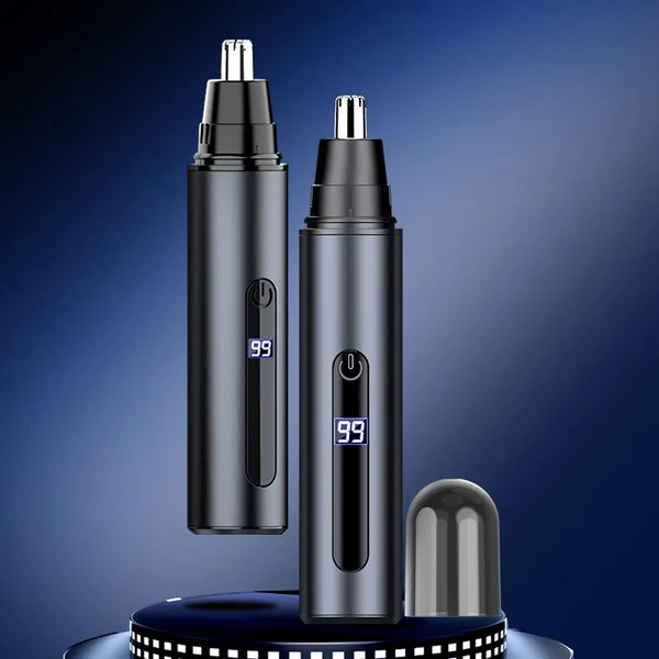 Une paire de ciseaux électriques rechargeables USB noirs pour poils de nez, debout sur une surface sombre.