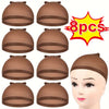 Eight brown nylon wig caps shown from various angles on a mannequin head.