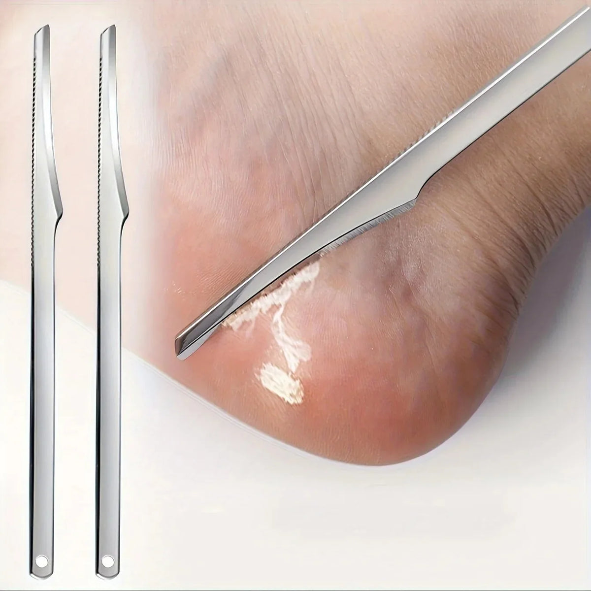 A set of stainless steel multi-piece foot care tools shown next to a foot with a small scrape.