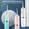 A portable tooth punch water flosser in three colors, including mint green and pink, displayed against a dark blue background