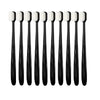 A set of ten ultra-fine bristle toothbrushes in black and white packaging.