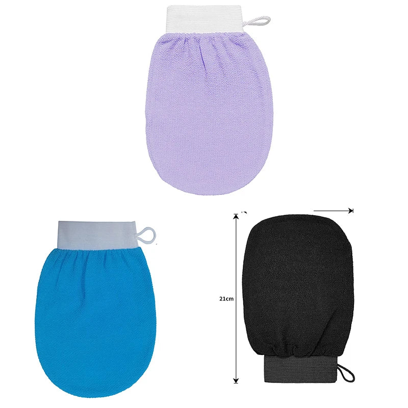 A pair of purple exfoliating body scrubbing gloves with a white cuff and a black exfoliating mitt.