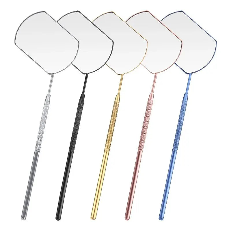 A set of five professional stainless steel lash extension mirrors with varying colored handles.