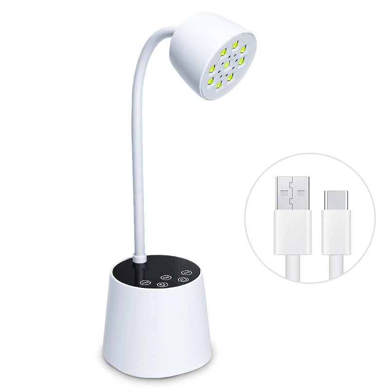 A white professional UV LED nail lamp with a flexible arm and a light panel, shown next to its power cord.