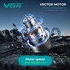 Vector Motor electric hair clipper trimmer with blue energy effects against a dark, rocky background.