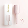 A pink MiniHuang beach waver curling iron is shown next to its packaging box.