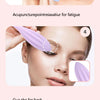 A woman is using a purple silicone gua sha roller on her face for facial massage and contouring.