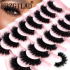 A tray of black natural mink striped false eyelash extensions is shown with a close-up of an eye.