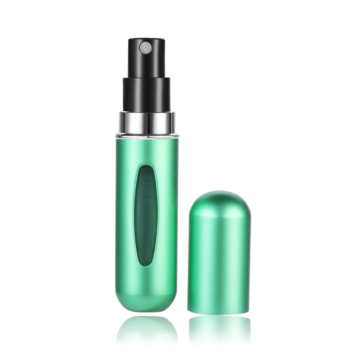 A green portable mini perfume refill spray bottle with a black cap and an empty glass bottle beside it.