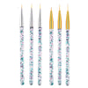 A set of precision nail art brushes with gold ferrules and clear handles featuring floral accents.