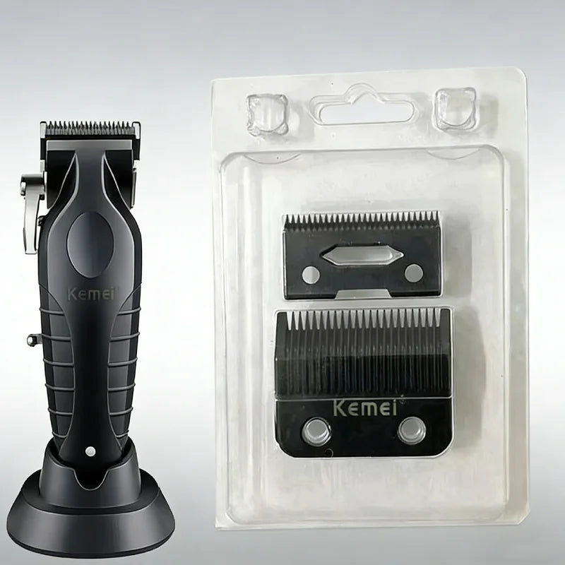 A black hair clipper replacement blade is shown next to its clear plastic packaging.