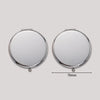 A portable folding makeup mirror with a round reflective surface and magnifier, shown from the top view.