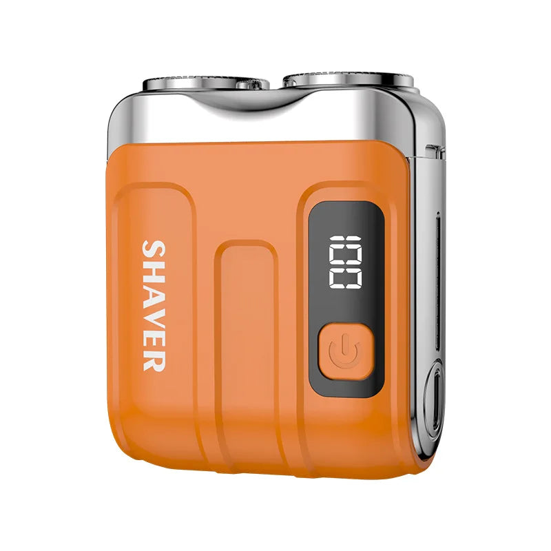 An orange and silver portable electric beard shaver with a black power button.