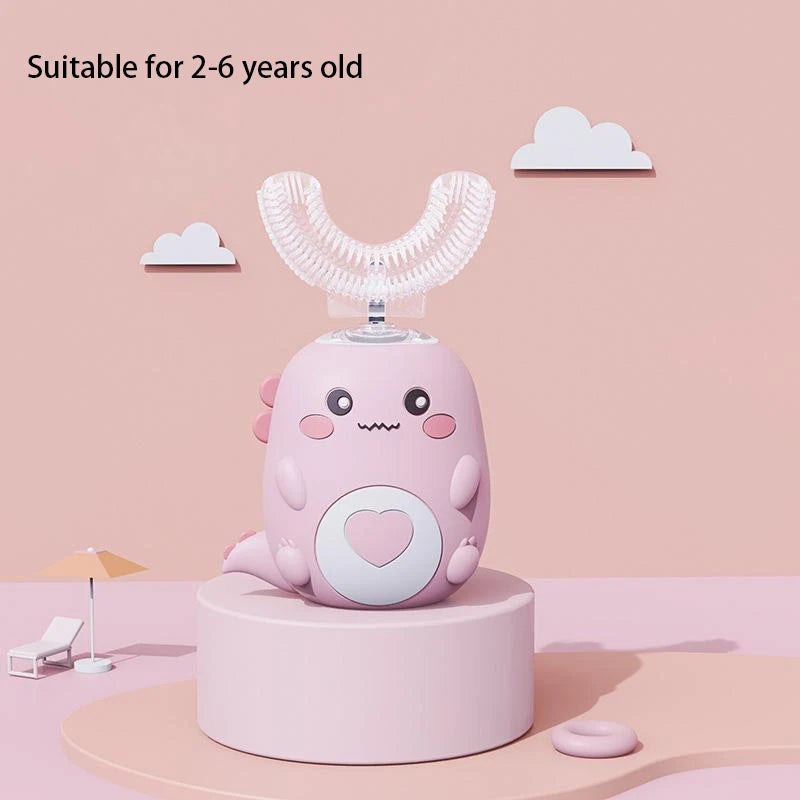 A pink cartoon-designed electric U-shaped toothbrush for children displayed on a stand against a light pink wall.