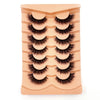 Un plateau de faux cils de mink 3D dramatiques de couleur nude rose.