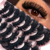 Close-up of a person's eye showing natural mink striped false eyelash extensions applied to the lash line.