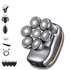 A professional electric double-blade hair shaver shown with various attachments and accessories.
