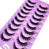 Un plateau en plastique d'faux cils de renard noir dans une teinte violette.