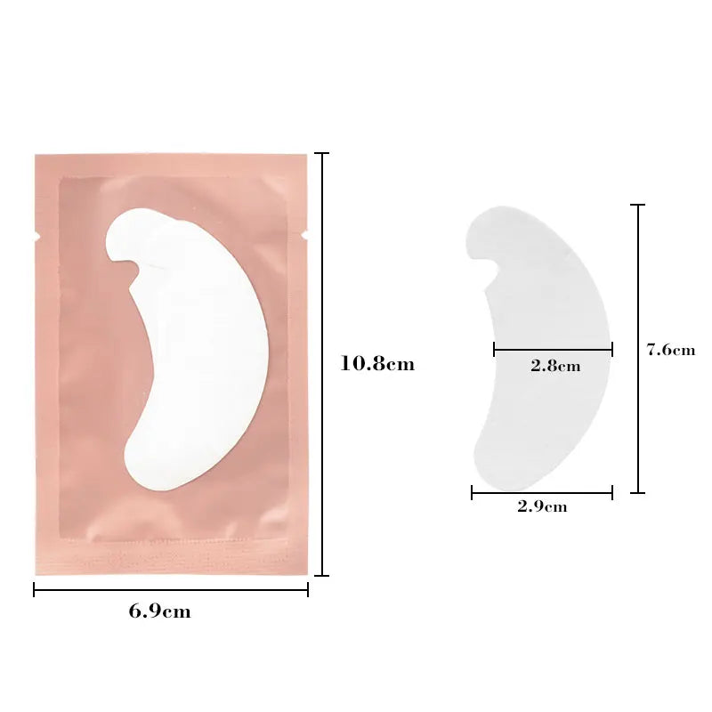 Un paquet de masques hydrogélifiés roses pour extensions de cils, montrant la taille et la forme des pads.