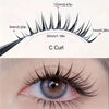 Close-up of a woman's eye showing wet look comic eyelash application.