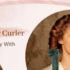 A woman with reddish-brown hair is shown smiling while using a velvet heatless hair curler to create bouncy curls.