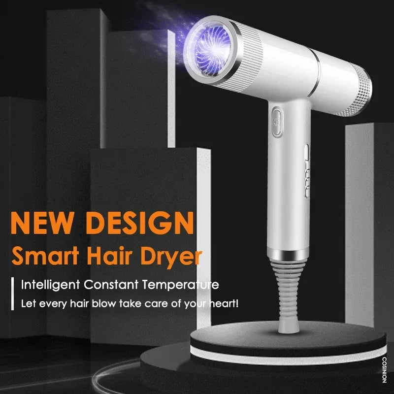 A silver smart hair dryer with a bright light beam is shown against a dark background.