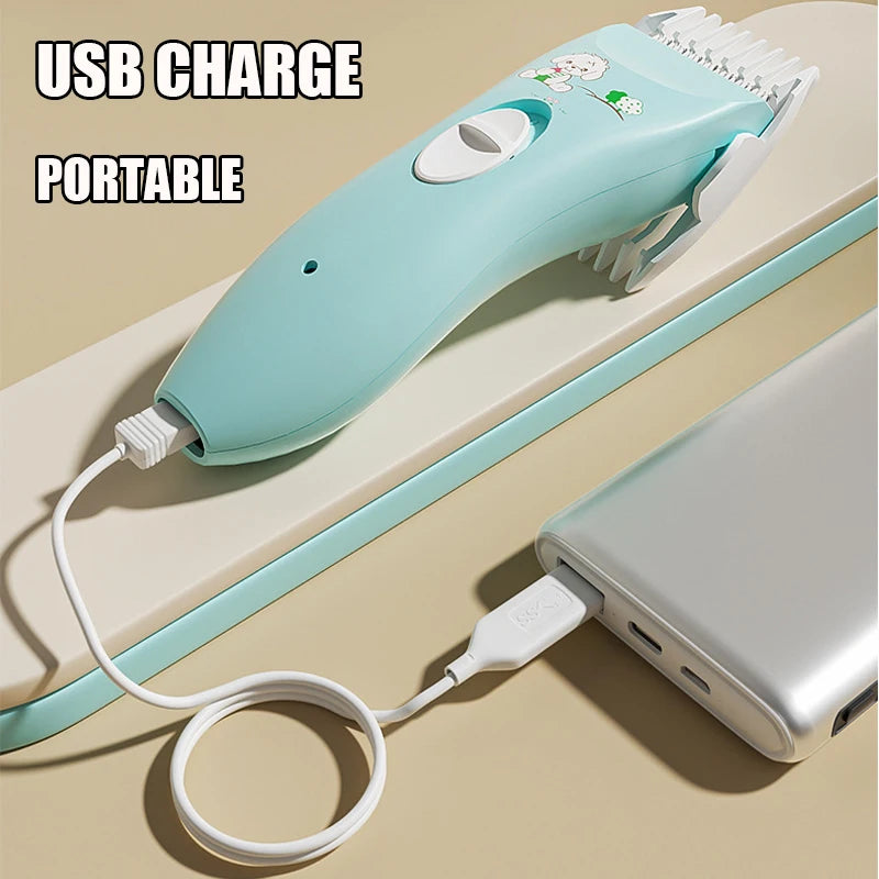 Portabler USB-ladbarer Keramik-Haarschneider für Babys und weißes Ladekabel auf einer hellen Oberfläche.
